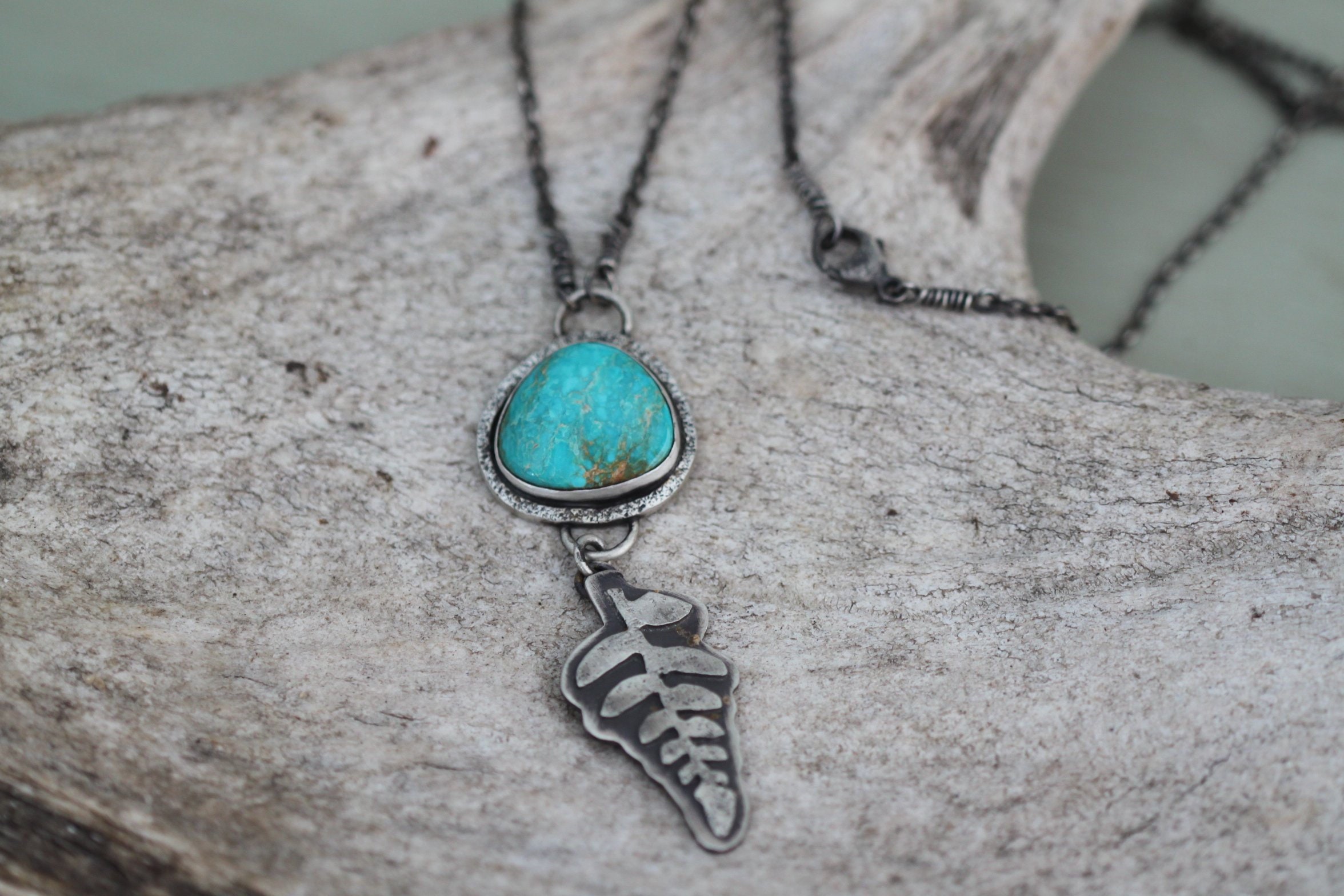 Silver leaf necklace with a turquoise dangle