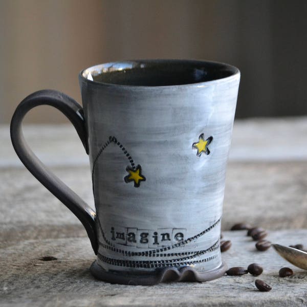 Pottery mug with shooting stars handmade coffee cup Imagine clear glaze inside