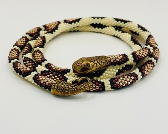 Cream and Bronze spot snake necklace