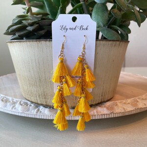 Yellow mini tassel earrings