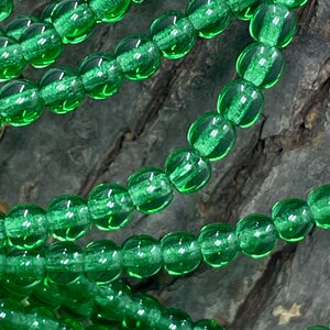 Green Emerald Transparent 100 3mm Round Pressed Czech Glass Druk Beads Green Emerald Transparent 100 3mm Round Pressed Czech Glass Druk Beads