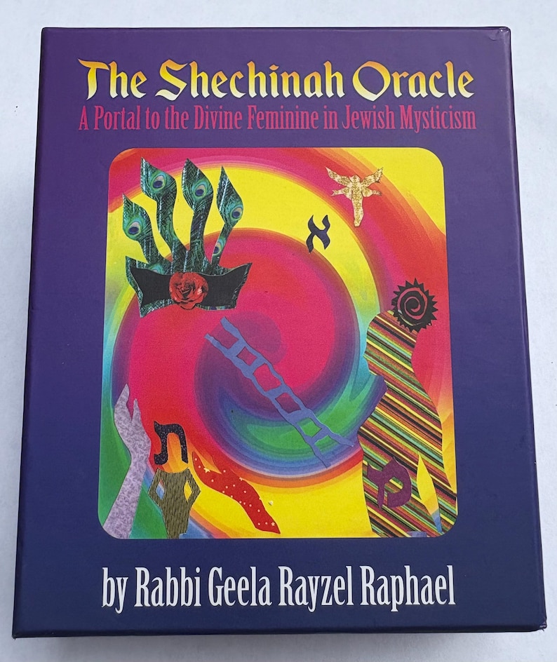 May include: A rectangular box with the title "The Shechinah Oracle" and the subtitle "A Portal to the Divine Feminine in Jewish Mysticism." The cover features colorful abstract art with a peacock feather design and the name "Rabbi Geela Rayzel Raphael."