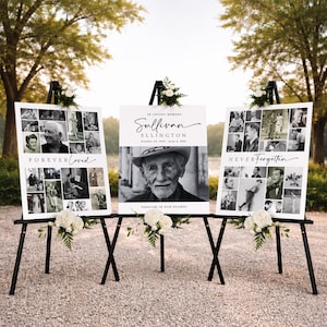 May include: Three memorial signs on black easels. The center sign features a black and white portrait and the text "Sullivan Ellington". The other signs display collages of photos with the phrases "Forever Loved" and "Never Forgotten". White floral arrangements adorn the easels.