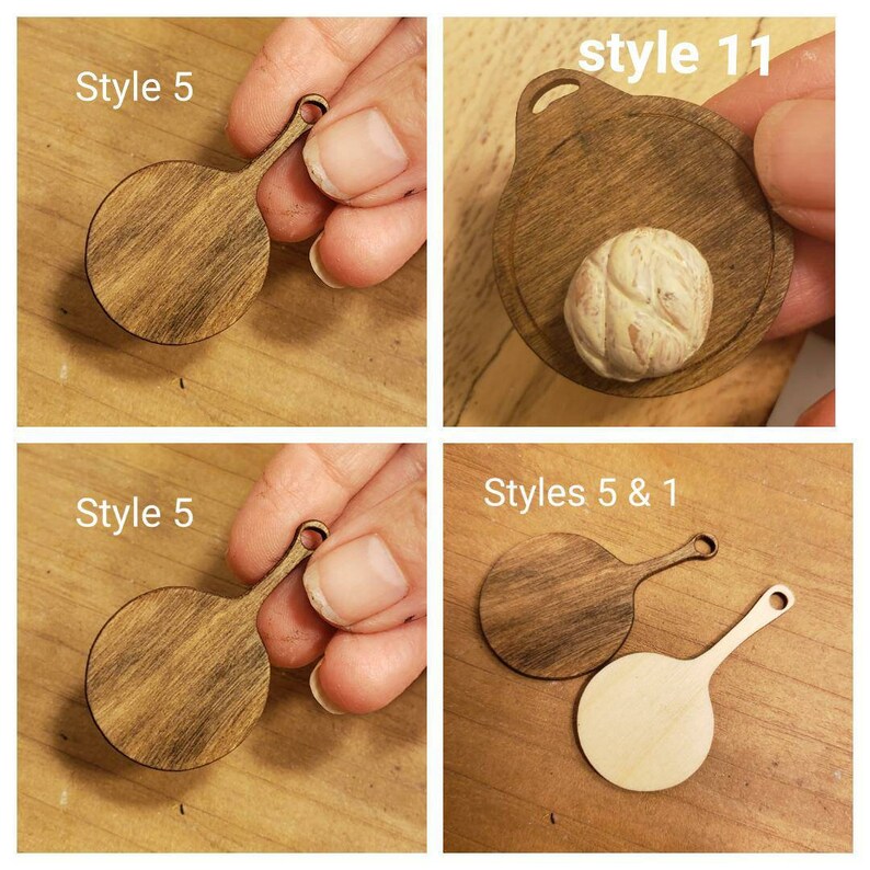 May include: Four different styles of wooden cutting boards. The first two are round and have a handle. The third is round and has no handle. The fourth is round and has a handle. The fourth cutting board is unfinished wood.