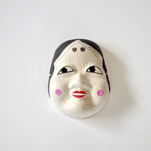 OKAM | omen mask Okame is the woman who appears in the myth of Japan.　It is a unique face mask.It is a unique face mask.
