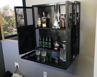Industrial steel locking liquor cabinet. Wall hanging with platform
