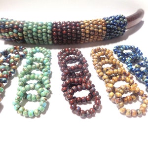 Your Choice of  Picasso Beaded Licorice oh rings  of your choice-- 5 colors to choose from-- 8/0 seed beads