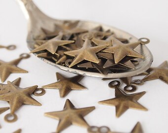 30 Metal Star Stampings Charms  Embossed Antique Brass Size 16 x 13mm Hole 1mm