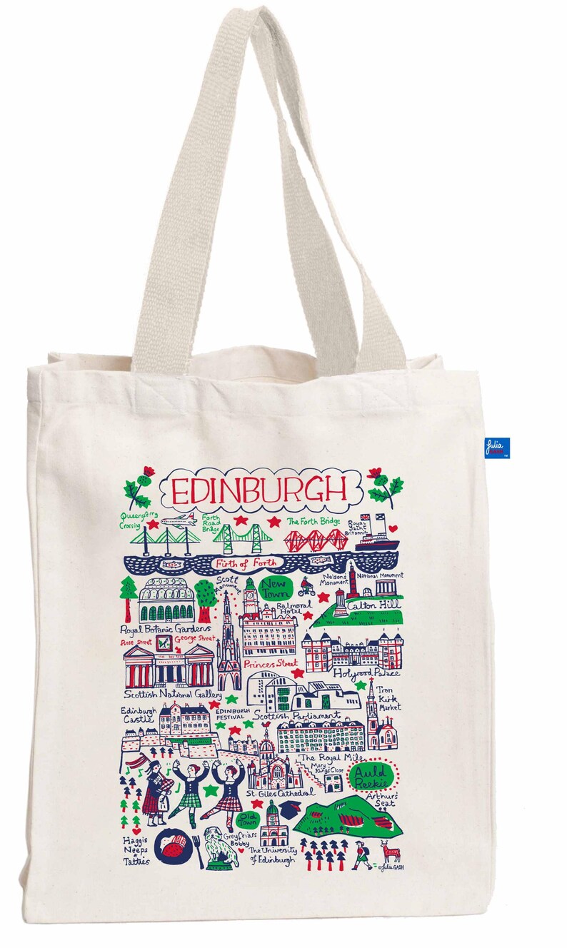 May include: Cream-colored tote bag featuring a colorful illustrated map of Edinburgh, Scotland. The design includes landmarks like the Forth Bridge, Edinburgh Castle, and the Scottish Parliament. The word "EDINBURGH" is at the top. The bag has cream-colored handles.