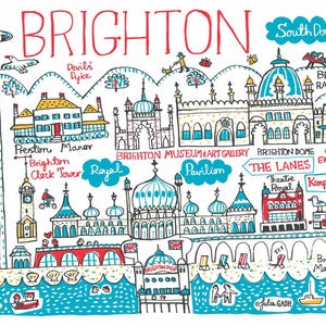 May include: A colorful illustrated map of Brighton, England, featuring landmarks like the Brighton Pier, Royal Pavilion, and Brighton Dome. The artwork includes the text "BRIGHTON" and various other place names, with whimsical drawings of buildings, boats, and people.