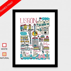 May include: A colorful illustrated map of Lisbon, Portugal, with landmarks and points of interest, including the Castelo de S&atilde;o Jorge, S&eacute; Catedral, Elevador de Santa Justa, and the Ponte 25 de Abril bridge. The map is framed in black.