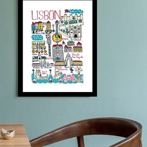 May include: A colorful illustrated map of Lisbon, Portugal, with landmarks and points of interest highlighted. The map features a blue and white tiled pattern, red and yellow buildings, and a guitar symbol.