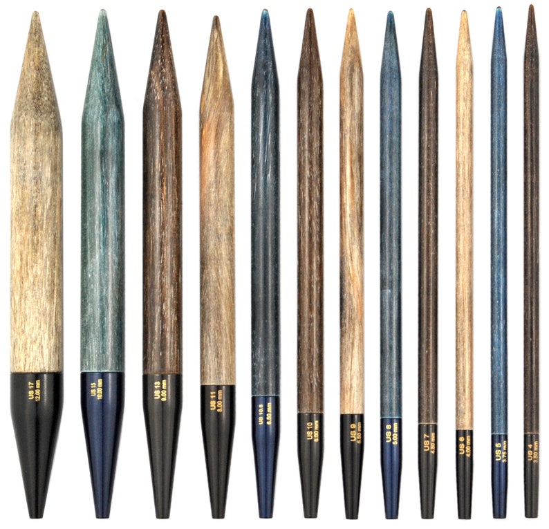 May include: A set of 12 double-pointed knitting needles in various sizes, ranging from US 4 (3.5 mm) to US 11 (8.0 mm). The needles are made of wood and have a dark blue and brown finish.