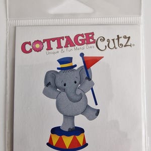 Troquel metálico "Elefante en equilibrio" de CottageCutz – 4,8 x 7,6 cm – Troquel para manualidades de papel con temática circense – Nuevo