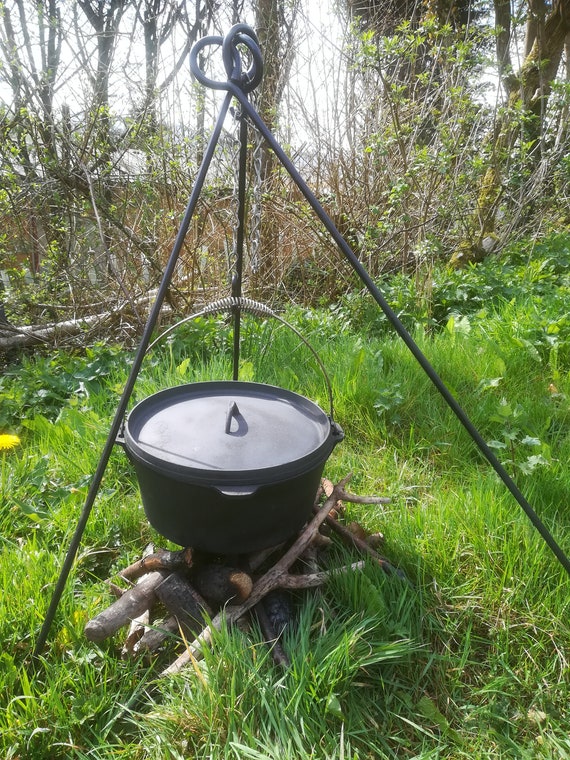 Premium Photo  Campfire camp kettle stands on fire in the stones