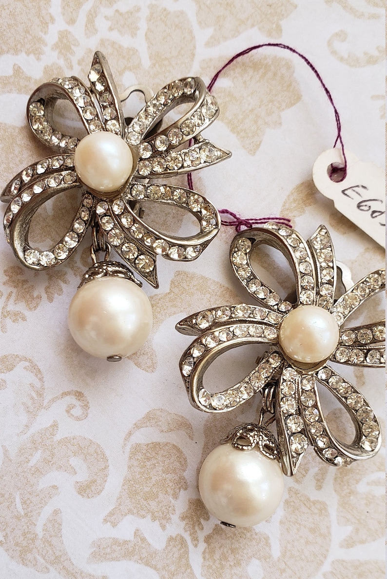 Vintage Ivory Faux Pearls on a Ribbony Design Clip-On Earrings.