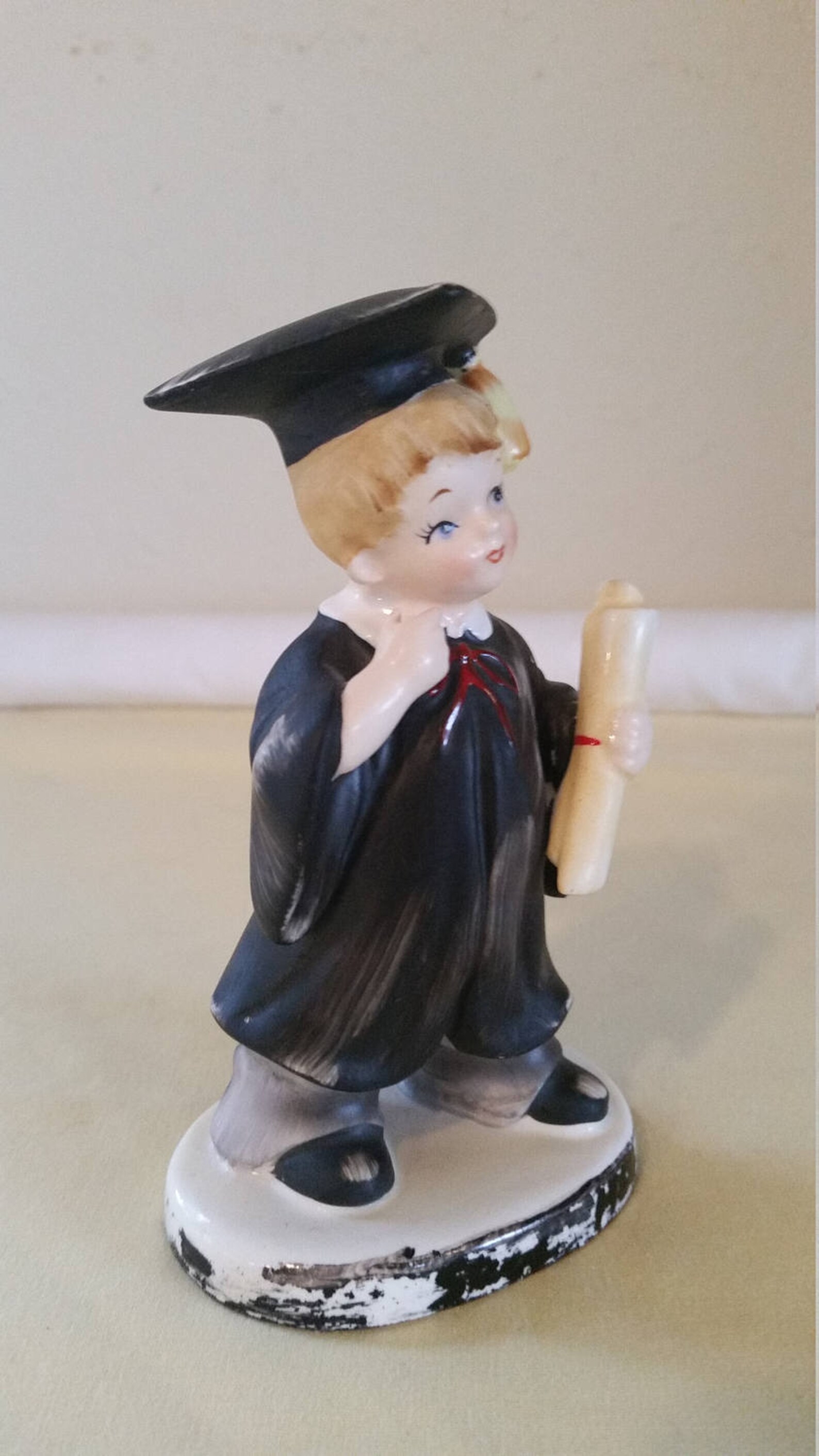 disney graduation figurine