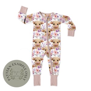 May include: A white baby sleeper with a repeating pattern of Highland cows and floral accents in pink, purple, and green. The sleeper has a full-length zipper and mauve cuffs. The text "PATTERN EXAMPLE ONLY" is on a circular graphic.