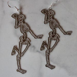 skeleton earrings, silver skeleton earring, happy skeleton jewelry, gift, gift for her, halloween, samhain, spooky jewelry, skeleton