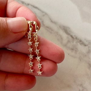 gold starburst huggie dangle earrings, gift, gift for her, gold earrings, star earrings, starburst earrings, chain earring, jewelry