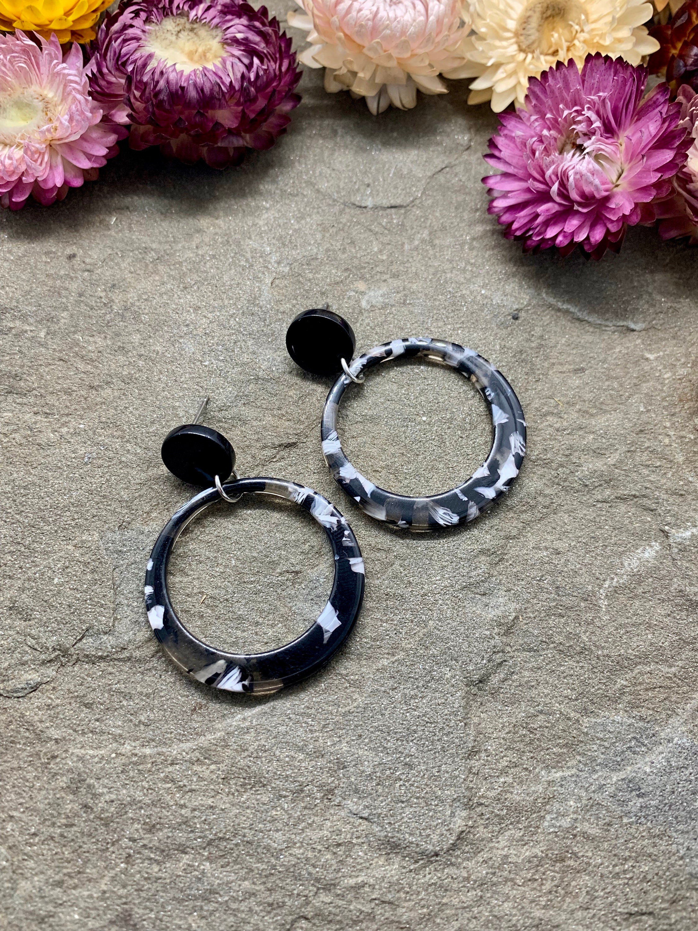 under black earring