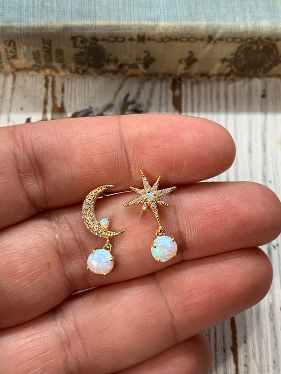 Dropship Celestial Moon & Star Drop Earrings Gold Moon Star With Crystal  And Blue Tonal Colored Stone Earrings For Women to Sell Online at a Lower  Price | Doba