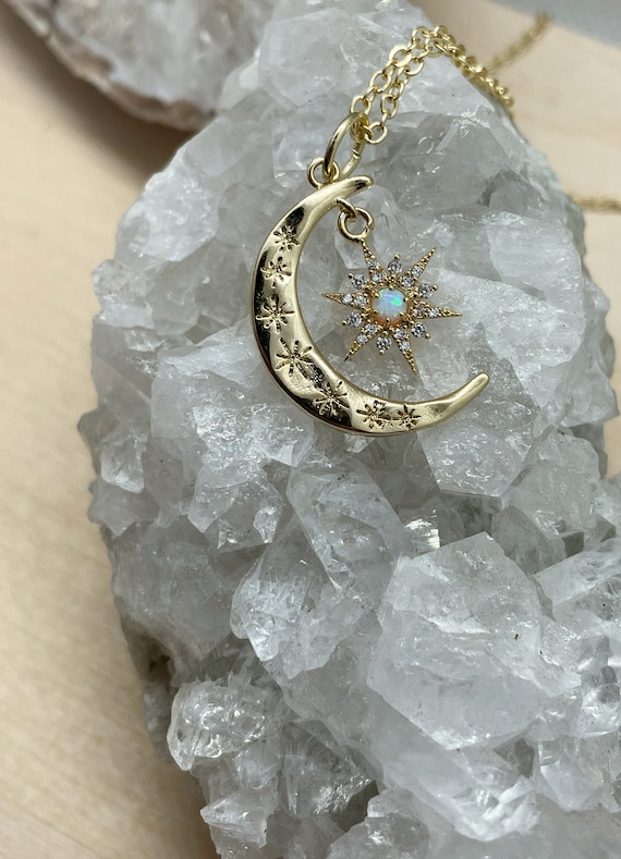 Golden Crescent Man and a Starburst Necklace Golden Crescent Man and a Starburst Necklace