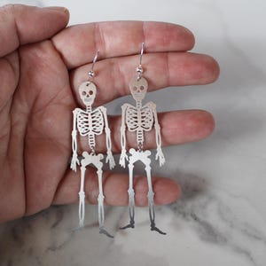 skeleton dangle earrings, silver earrings, gold earrings, silver jewelry, hypoallergenic, halloween, october, spooky, skeleton, gift, skull