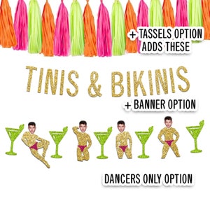 May include: Gold glitter banner with the text "TINIS & BIKINIS" and the words "TASSELS OPTION ADDS THESE", "BANNER OPTION", and "DANCERS ONLY OPTION" in smaller text.  The banner is decorated with green and orange tassels.