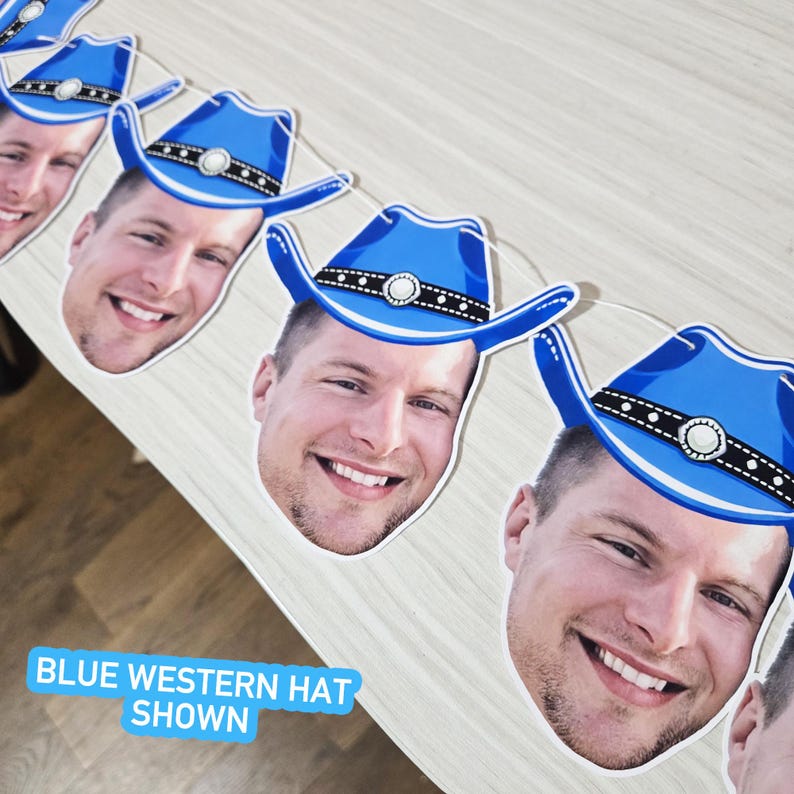 May include: A string of blue cowboy hat cutouts with a smiling face printed on each. The hats have a black band with white dots and a silver buckle. The text "BLUE WESTERN HAT SHOWN" is visible.