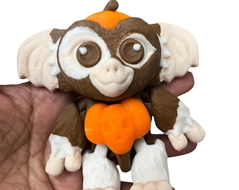 Articulated Halloween Pumpkin Gizmo Gremlin  multicolored filament 3D printed in PLA filament