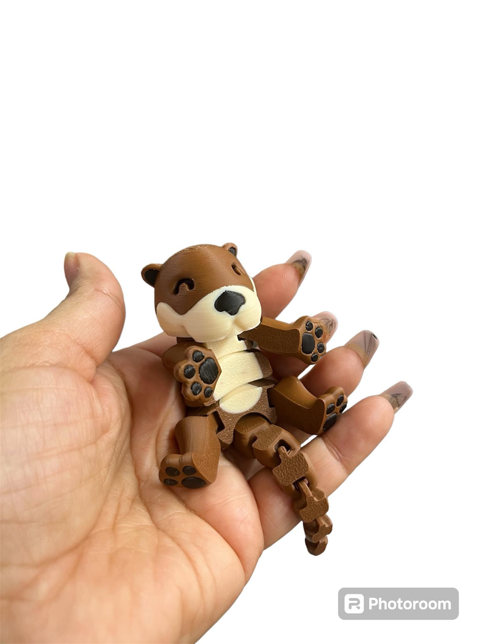 Articulated  multicolored 3D Otter printed in PLA filament