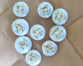 Pearl encrusted (inlaid) with diamond polki and gold.