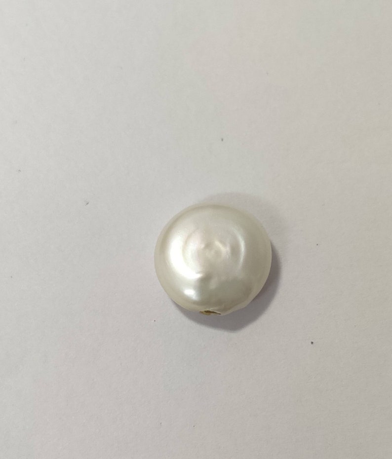 inlaid Pearl encrusted with diamond polki and gold.
