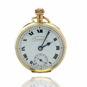 A genuine Antique 18K Gold Swiss pocket watch in working condition (Manual Winding)