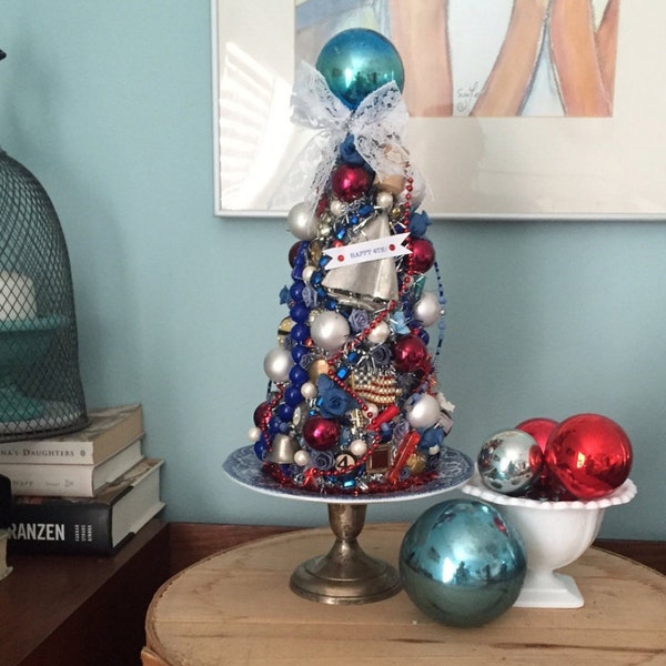 Shabby Chic Vintage Inspired Fourth of July patriotic decoration with vintage jewelry, glass ornaments, buttons, flowers and figurines