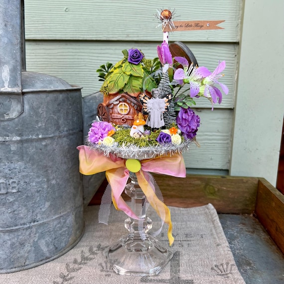 Whimsical Fairy Garden on Glass Pedestal – Spring Cottage Decor with Vintage Fairy, Mini Mushrooms & Floral Details