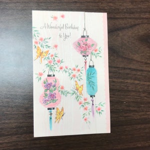 Vintage kaart, jaren 1950, 1960, gelukkige verjaardagswensen, papieren lantaarns, Chinese lantaarns, vintage briefpapier, tuin, bloemen, gestanst