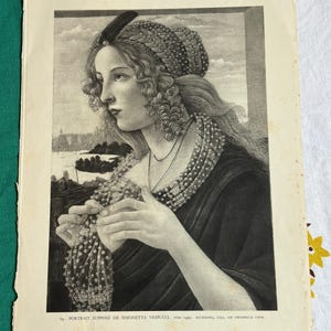 May include: Black and white print of a portrait of a woman, possibly from the Renaissance era. The woman is wearing a jeweled headdress and necklace. The print has text at the bottom: "PORTRAIT SUPPOSE DE SIMONETTA VESPUCCI VERS 1490."