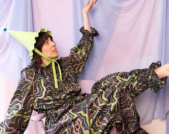 Playful jumpsuit, black and green swirls