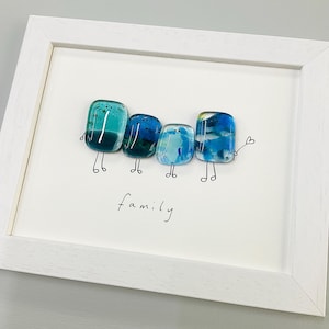 Glass pebble wall art - framed fused glass pebble people picture handmade in Cornwall by Niko Brown