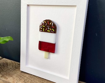 Glass lolly wall art - framed fused glass fab lolly handmade in Cornwall by Niko Brown