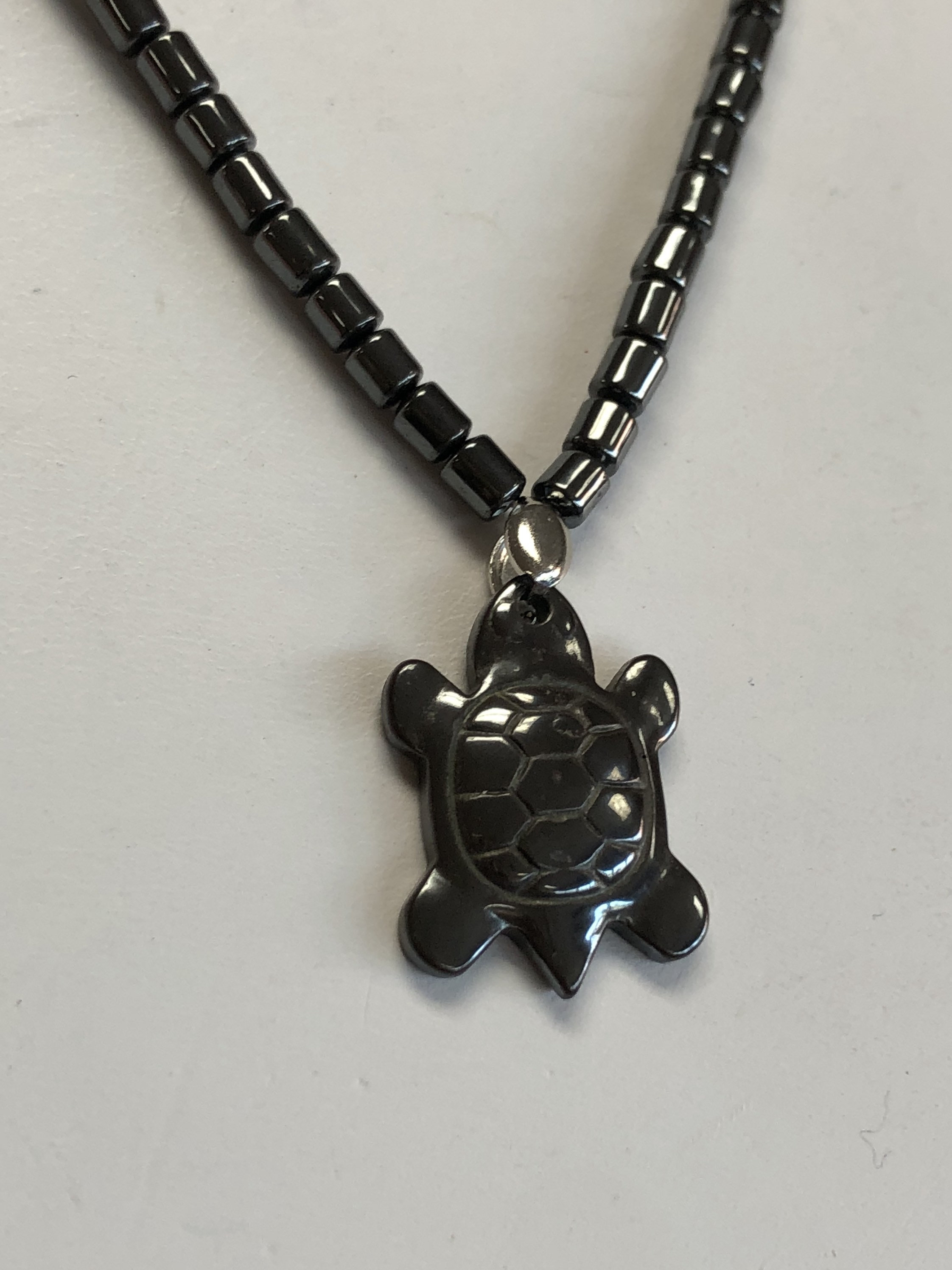 Hematite turtle hotsell necklace