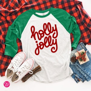Camiseta navideña con gráficos festivos y raglán
