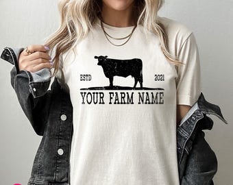 Personalized Cow Farming Graphic Tee: Custom Farm Name with Year T-Shirt