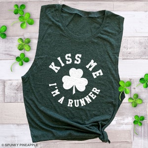 Kiss Me I'm a Runner Shamrock Muscle Tee: Funny St Patricks Day Tank Top Women