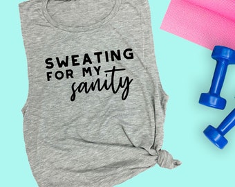 May include: Gray sleeveless workout tank top with black text that reads "Sweating for my sanity".