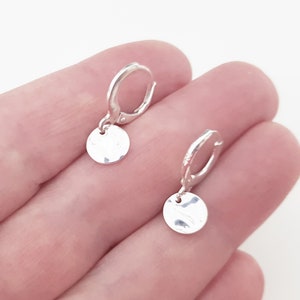 Sterling Silver Huggie Hoops with Hammered Disk Charms, Minimalist Style Dangle Earrings, Fine Silver Simple Everyday Jewelry.