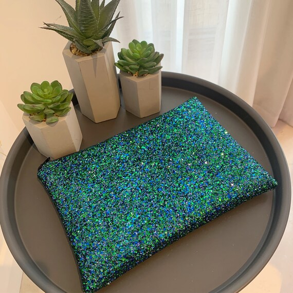 Blue and green clutch bag on sale