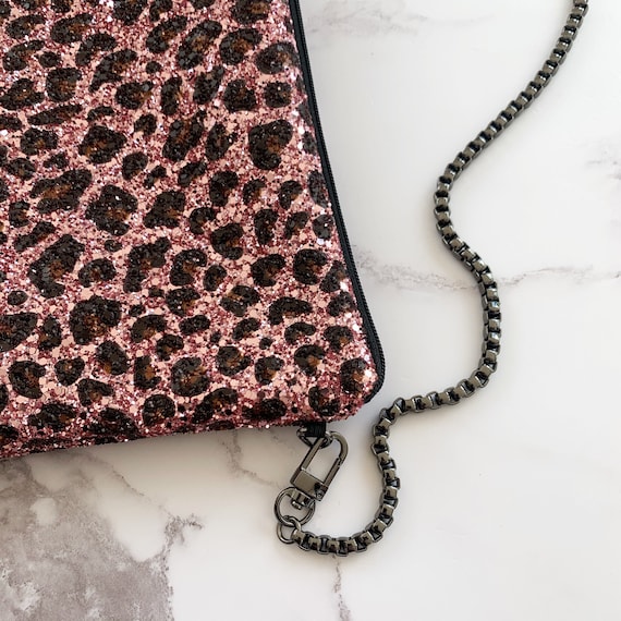 Pink leopard hotsell print clutch bag
